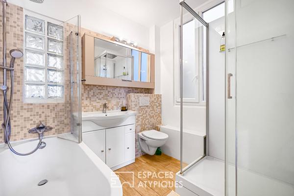 Etage élevé traversant avec balcon-terrasse à Auteuil Sud