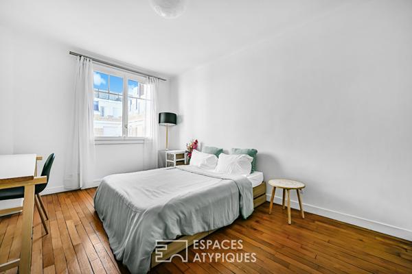 Etage élevé traversant avec balcon-terrasse à Auteuil Sud