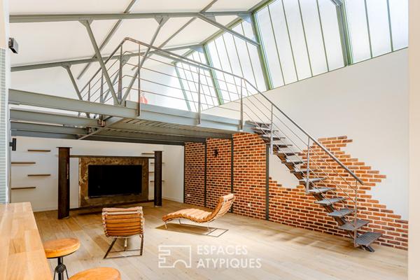 Anciens entrepôts de presse réhabilités en loft de plain pied avec patios