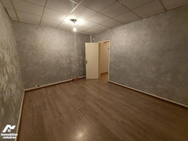 Immeuble à vendre à ATTIGNY (08130) comprenant 4 appartements, 1 local professionnel et deux garages