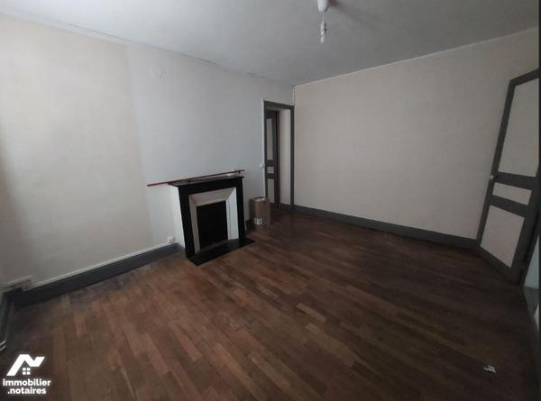 Immeuble à vendre à ATTIGNY (08130) comprenant 4 appartements, 1 local professionnel et deux garages