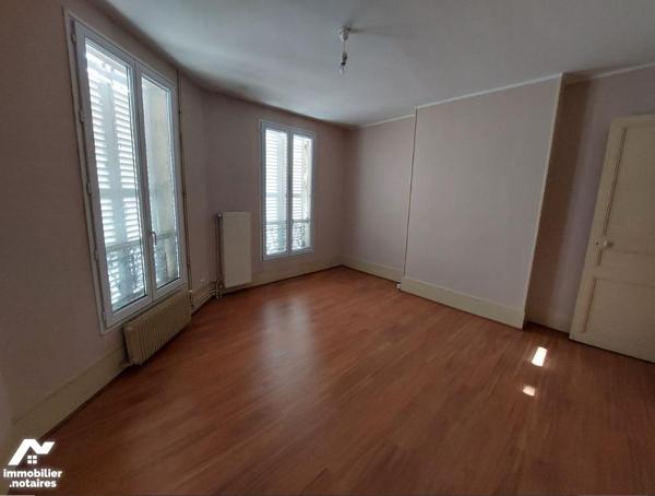 Immeuble à vendre à ATTIGNY (08130) comprenant 4 appartements, 1 local professionnel et deux garages