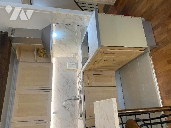 Duplex en très bon état situé 28 rue de Nantes, PARIS 19eme.