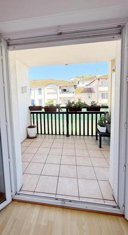 Joli T2 avec véranda, terrasse, parking et cave