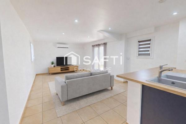 Maison individuelle avec terrasses et jardin – 94 m² – Proche centre
