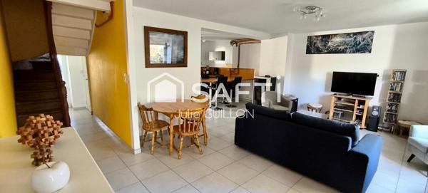 Charmante maison avec 35 m² à exploiter.