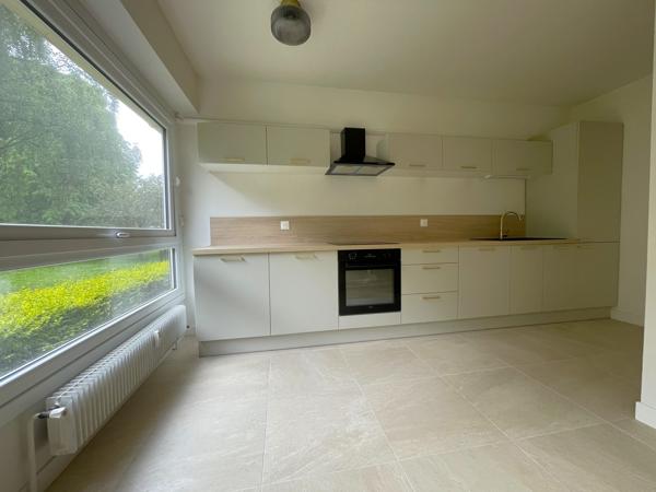 Superbe appartement traversant 3 chambres avec garage et cave