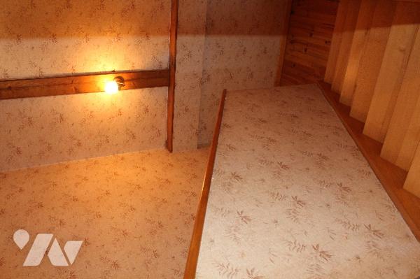 Maison individuelle sur sous-sol avec 5 chambres sur un terrain paysagé d'env. 630m²