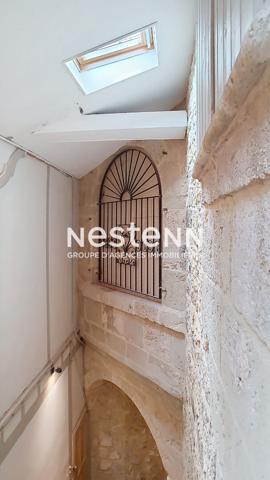 Appartement lumineux de 100 m2 et deux chambres ainsi qu'un balcon au coeur de Nérac, proche commerces