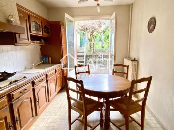 Maison de ville avec garage et jardin