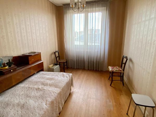 Maison de ville avec garage et jardin