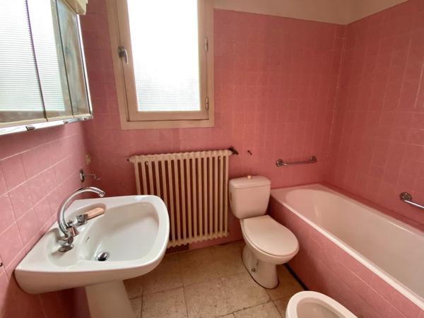 Maison de ville avec garage et jardin