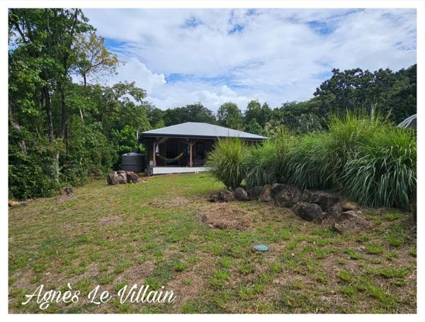Terrain Plat avec petite maison proche Plage de Grande Anse