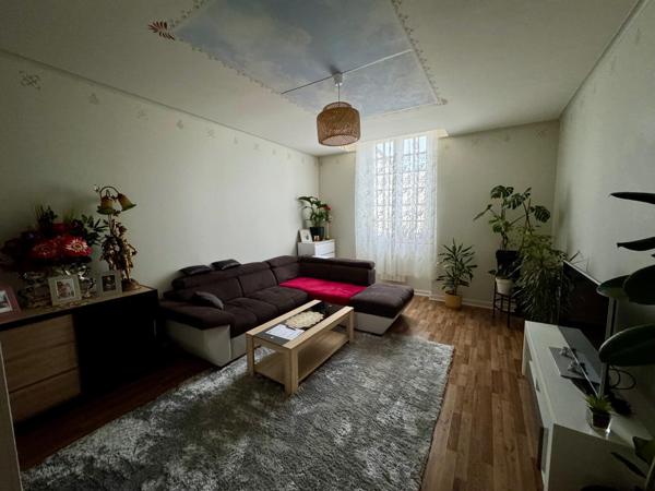 Immeuble de rapport local commercial et 5 appartements