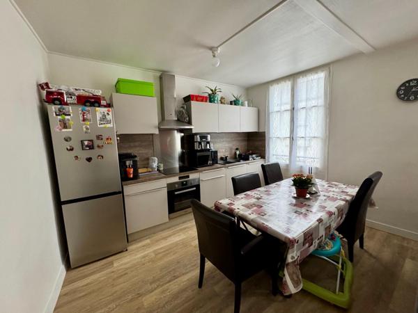 Immeuble de rapport local commercial et 5 appartements