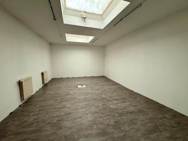 Immeuble de rapport local commercial et 5 appartements