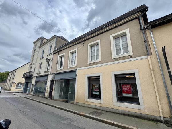 Immeuble de rapport local commercial et 5 appartements