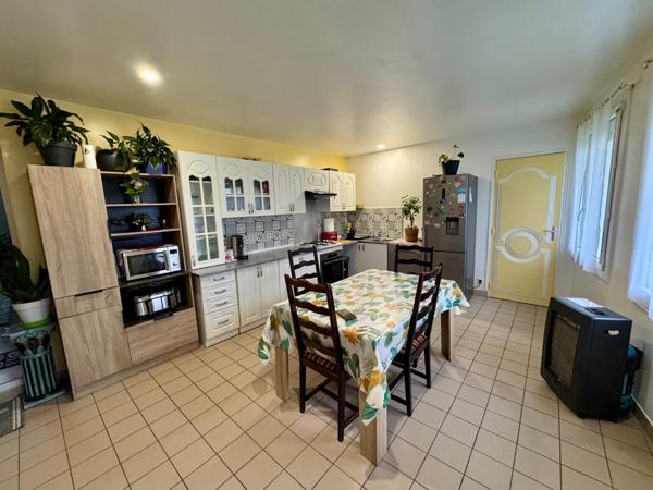 Immeuble de rapport local commercial et 5 appartements