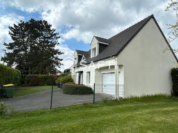 Pavillon 4 chambres avec garage et jardin, secteur très calme.