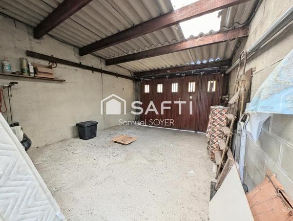 MAISON AVEC GARAGE ET JARDIN PROCHE COMMERCES