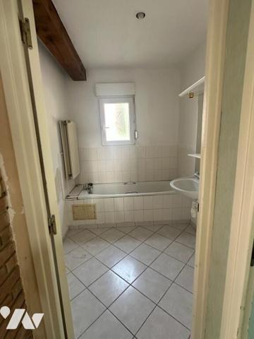 Maison individuelle à vendre à proximité du centre de BAPAUME et aussi de l'autoroute A1 compre...