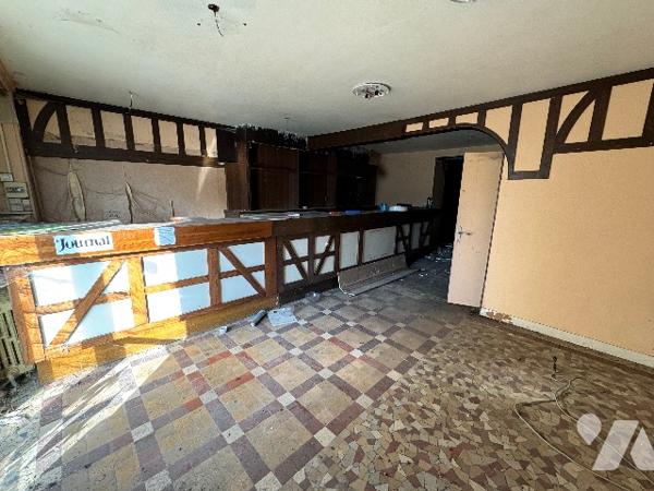 Maison avec commerce au rez-de-chaussée (157m²) à rénover