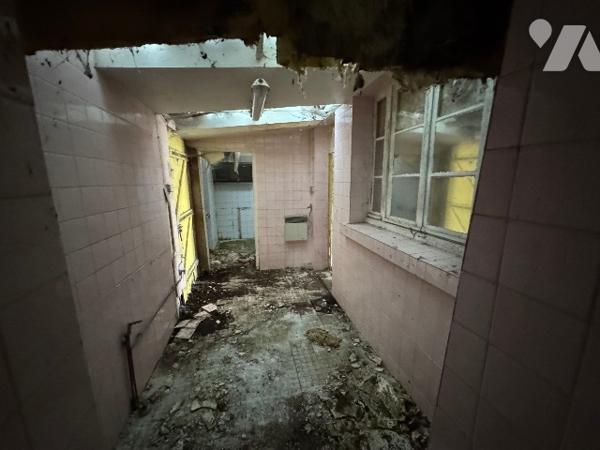 Maison avec commerce au rez-de-chaussée (157m²) à rénover