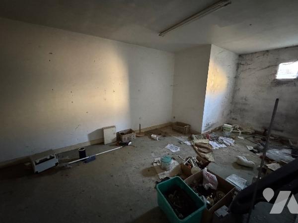 Maison avec commerce au rez-de-chaussée (157m²) à rénover