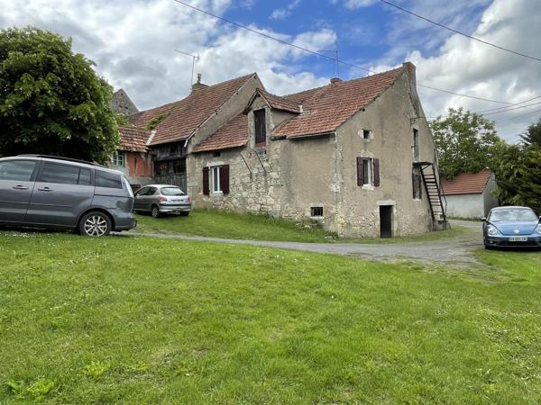 Joli potentiel pour cette ancienne propriété avec dépendances