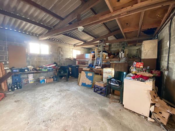 À VENDRE MAISON COMPOSÉE DE 2 APPARTEMENTS À MERDRIGNAC PROCHE DES COMMODITÉS