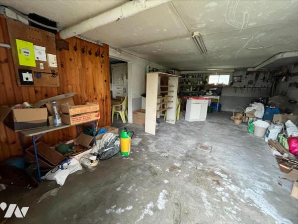 MAISON SUR SOUS-SOL COMPLET