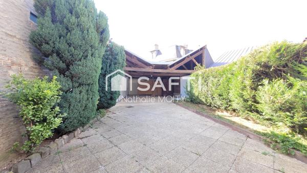 GRANDE MAISON ATYPIQUE T6  en CENTRE VILLE de St-Quentin, grande terrasse et accès véhicule