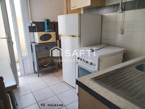 Maison de 200m² avec 4 chambres, garage piscine + local commercial tout commerce sur 760m² de terrain