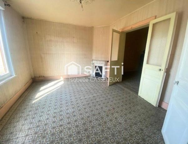 Maison de ville - pièces spacieuses - 2 chambres - jardin - garage