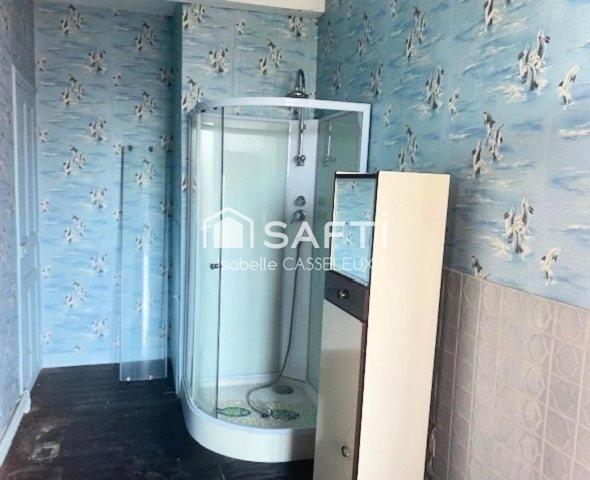 Maison de ville - pièces spacieuses - 2 chambres - jardin - garage