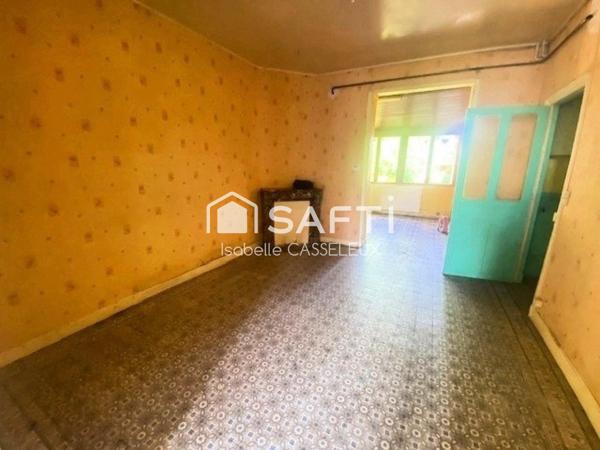 Maison de ville - pièces spacieuses - 2 chambres - jardin - garage