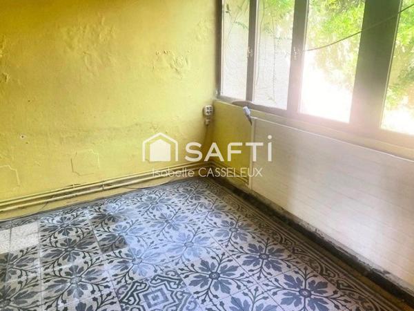 Maison de ville - pièces spacieuses - 2 chambres - jardin - garage