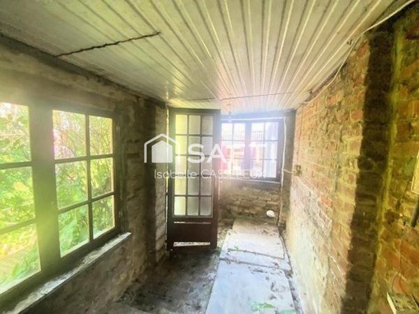 Maison de ville - pièces spacieuses - 2 chambres - jardin - garage