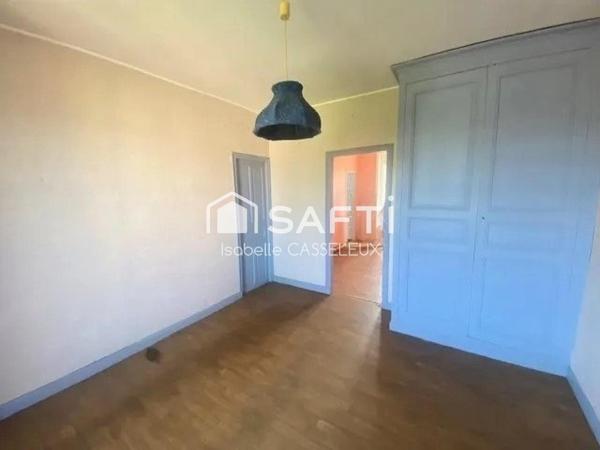 Maison de ville - pièces spacieuses - 2 chambres - jardin - garage