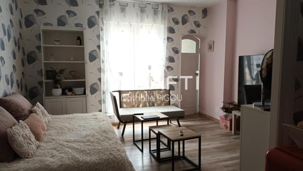 Immeuble avec local commercial