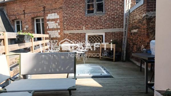 Immeuble avec local commercial