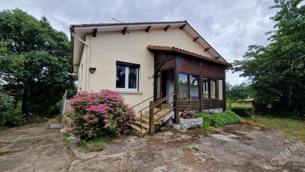 Maison surélevée avec garage et potentiel studio sur 1 260 m² de terrain à Prigonrieux