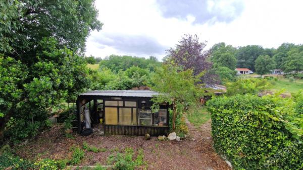 Maison surélevée avec garage et potentiel studio sur 1 260 m² de terrain à Prigonrieux