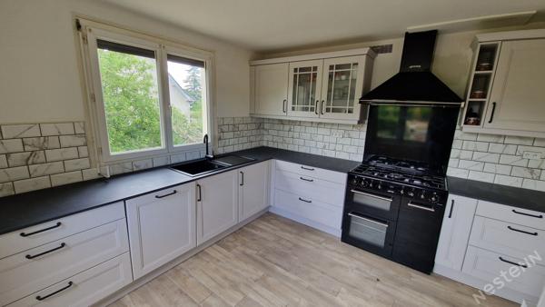 Maison surélevée avec garage et potentiel studio sur 1 260 m² de terrain à Prigonrieux