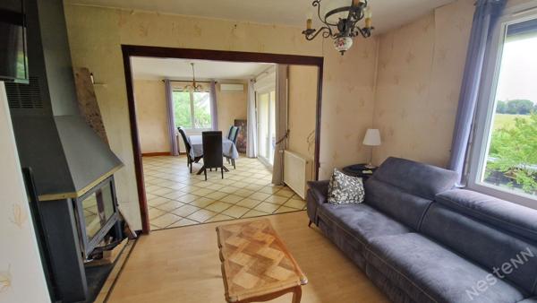 Maison surélevée avec garage et potentiel studio sur 1 260 m² de terrain à Prigonrieux