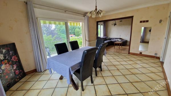 Maison surélevée avec garage et potentiel studio sur 1 260 m² de terrain à Prigonrieux