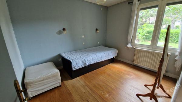 Maison surélevée avec garage et potentiel studio sur 1 260 m² de terrain à Prigonrieux