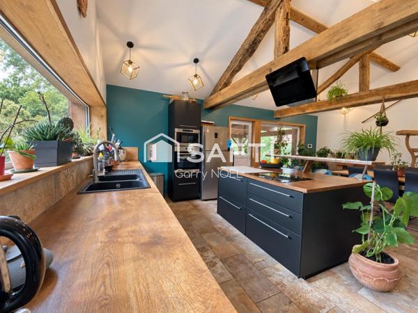 Maison de 136m² 3 chambres avec 4 hectares et atelier.