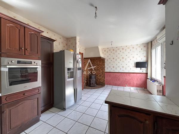 Maison familiale avec jardin et sous-sol complet