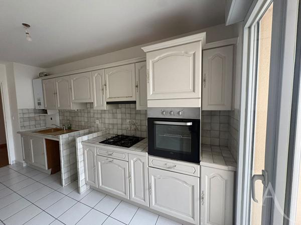 Appartement 3 pièces avec balcon, cave et box - Résidence sécurisée